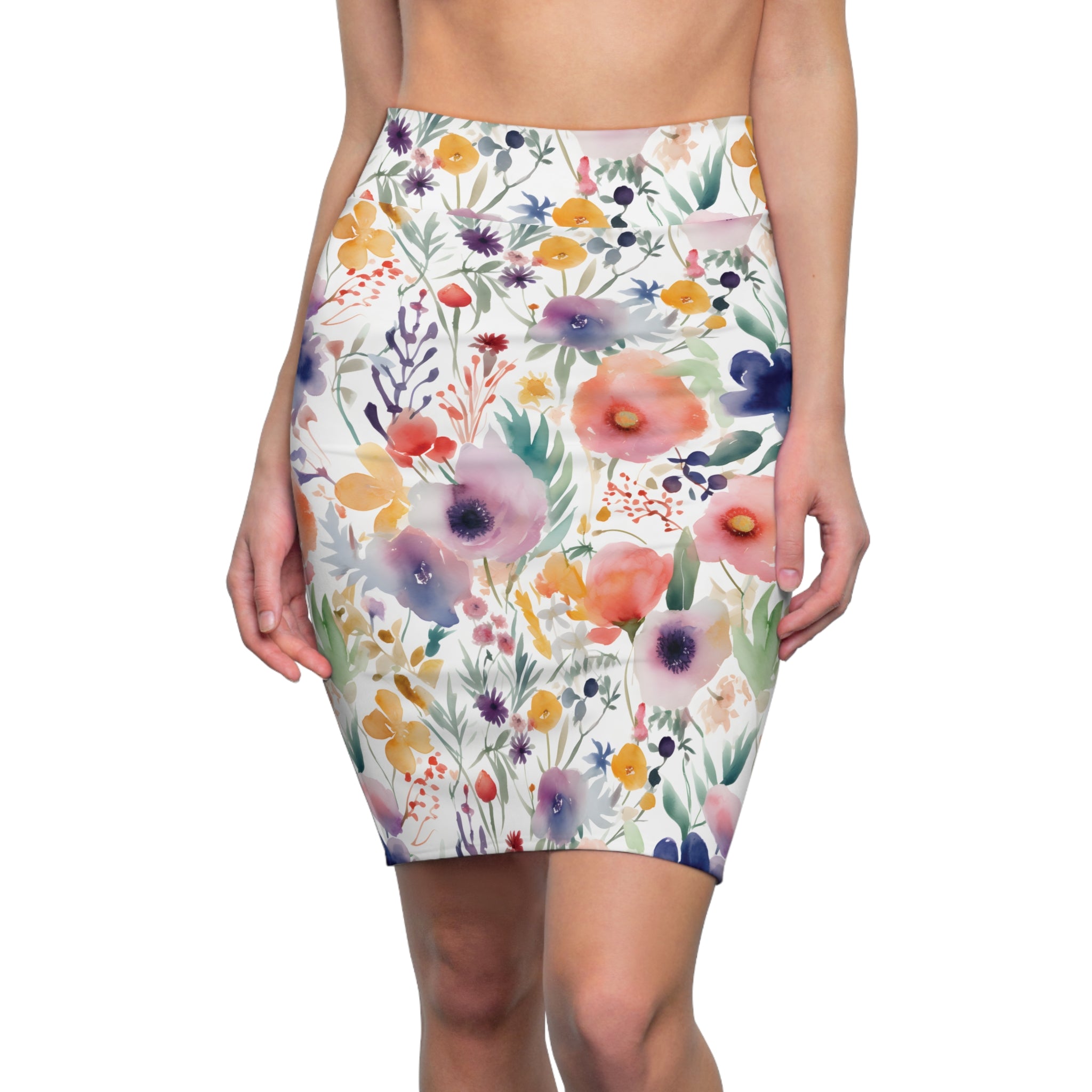 A colourful watercolour floral and leaf print, mid waist, above knee length, bodycon pencil skirt made in the USA.